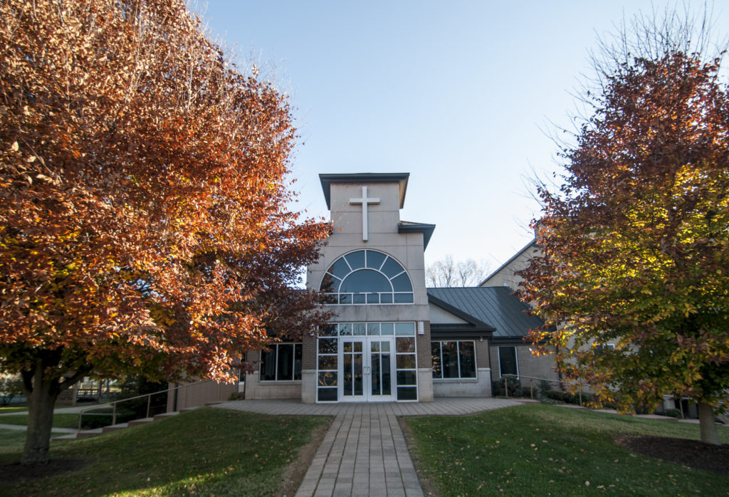 Immaculate Heart of Mary Chapel surrounded by fall leaves