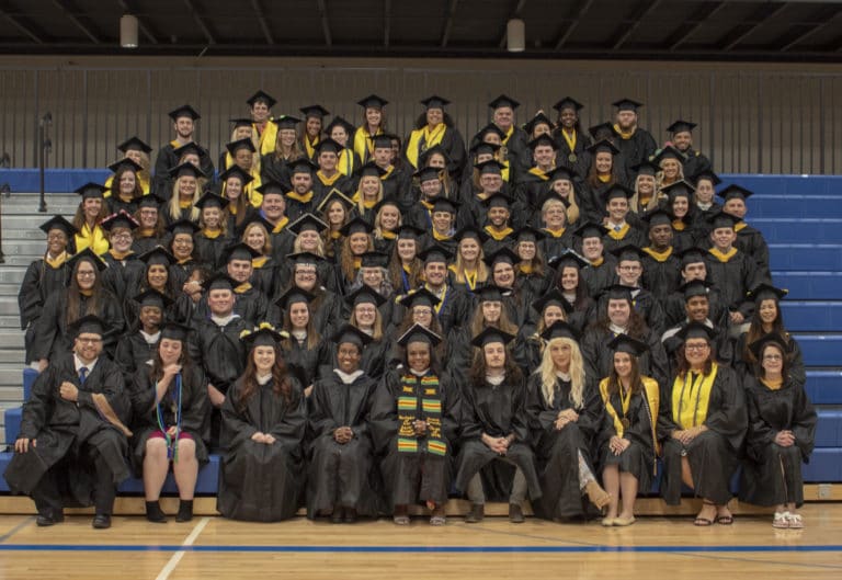 Group photo of the Class of 2019 on bleachers